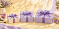 Three closed wellness sample boxes decorated with purple ribbons and hearts